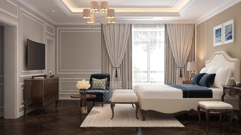 Giường bọc nệm trắng kết hợp sắc trầm từ ghế, đôn sofa, kệ tivi gỗ óc chó đã tạo nên bức tranh hài hòa, đẹp, sang trọng trong phòng ngủ master tân cổ điển. Mẫu nội thất biệt thự đẹp